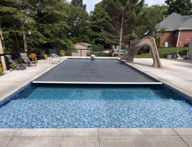 image of an inground automatic pool cover in Louisville, KY